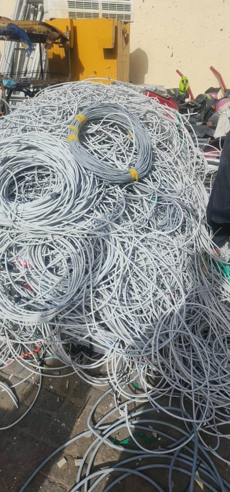Large pile of grey cable scrap
