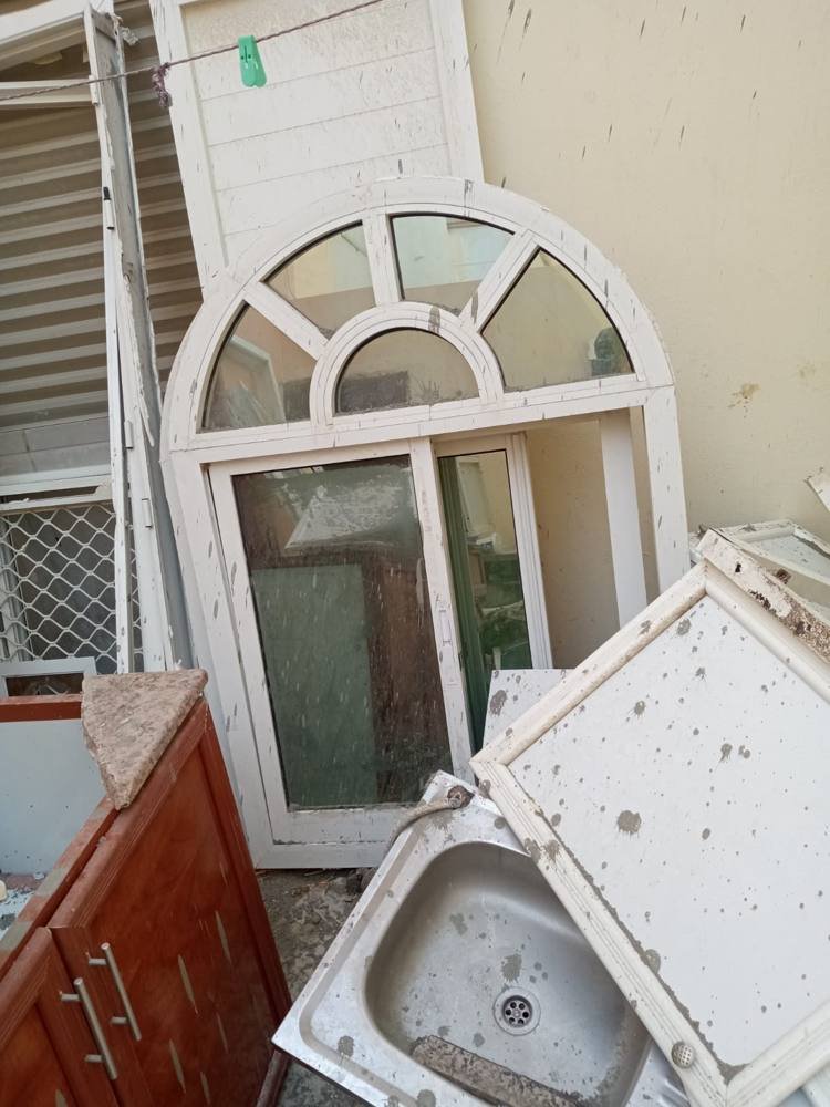 Aluminum window frames and stainless steel sink scrap